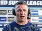 Warrington Wolves head coach Sam Burgess pictured during a post-match interview.