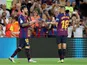 Lionel Messi celebrates with Jordi Alba after scoring Barcelona's opening goal against Alaves on August 18, 2018