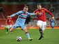 West Ham United's Jarrod Bowen in action with Manchester United's Luke Shaw in the Premier League on March 14, 2021