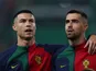 Portugal's Cristiano Ronaldo and Diogo Costa line up before the match on November 19, 2023