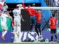 Spain's Gerard Pique handles the ball in the area resulting in a penalty being awarded to Russia on July 1, 2018