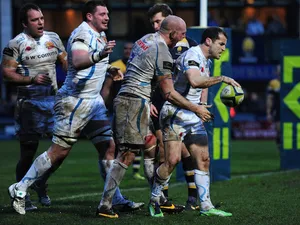 Haydn Thomas (R) of Exeter Chiefs celebrates his try with his team-mates during the LV= Cup match against Worcester Warriors on February 1, 2014