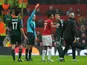 Manchester United's Nani is shown a red card during the second half against Real Madrid on March 5, 2013