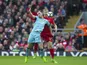 Ashley Barnes and Ragnar Klavan in action during the Premier League game between Liverpool and Burnley on March 12, 2017