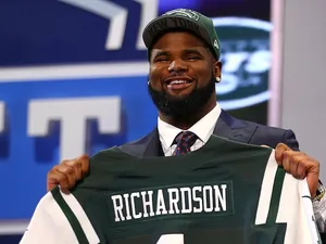 Sheldon Richardson of the Missouri Tigers holds up a jersey on stage after he was picked overall by the New York Jets in the first round of the 2013 NFL Draft at Radio City on April 25, 2013