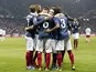 France's midfielder Yohan Cabaye (C) celebrates with teammates after scoring a goal during the friendly football match between France and Armenia on October 8, 2015 at the Allianz Riviera stadium in Nice, southeastern France.