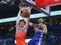 Oklahoma City Thunder forward Mike Muscala (33) dunks in front of Golden State Warriors guard Jordan Poole (3) during the second half at Chesapeake Energy Arena