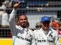 Mercedes' Lewis Hamilton celebrates pole after qualifying with second place Mercedes' Valtteri Bottas on June 22, 2019