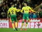 Norwich City's Jamal Lewis celebrates scoring their first goal with Max Aarons on February 28, 2020