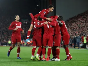 Five-star Liverpool thrash Arsenal to move nine clear