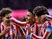 Thiago Almada of Atletico de Madrid (C) celebrates his goal with Julian Alvarez (L) and Giuliano Simeone