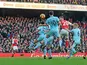 Shkodran Mustafi heads in the opener during the Premier League game between Arsenal and Burnley on January 22, 2017
