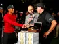 Phil Mickelson and Tiger Woods shake hands after their head-to-head on November 24, 2018