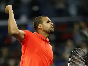 Tsonga overcomes Sock to reach last eight