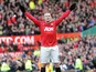 Wayne Rooney celebrates after scoring his team's second goal from a free-kick against Chelsea in the FA Cup quarter final on March 10, 2013