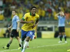 Late Paulinho goal sends Brazil to final