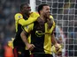 Watford's Troy Deeney celebrates scoring their first goal with Abdoulaye Doucoure on January 21, 2020