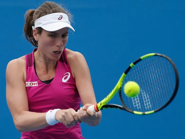 Johanna Konta seals quarter-final spot