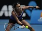 Britain's Heather Watson hits a forehand return during her match against Agnieszka Radwanska at the Australian Open tennis championship on January 18, 2013