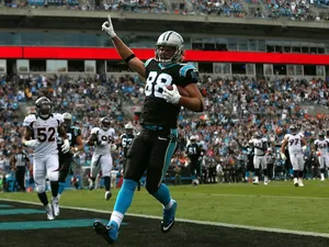 Carolina TE Greg Olsen celebrates a touchdown during their game against Denver at Bank of America Stadium on November 11, 2012 