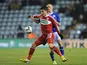 Leicester City's Paul Konchesky and Middlesbrough's Emmanuel Ledesma battle for the ball on January 18, 2013
