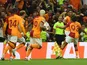 Galatasaray's Tete celebrates scoring their second goal with teammate Sacha Boey on September 20, 2023