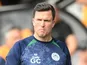 Wigan Athletic manager Gary Caldwell at half time on August 15, 2026