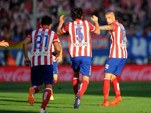 Atletico held by 10-man Malaga