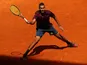 Nick Kyrgios plays a forehand during his straight-sets victory against Stanislas Wawrinka in their second-round match during day five of the Madrid Open on May 04, 2016