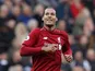 Liverpool defender Virgil van Dijk celebrates scoring against Newcastle on May 4, 2019