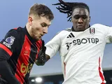 Calvin Bassey of Fulham challenged by David Brooks of Bournemouth on December 29, 2024
