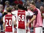 Tolu Arokodare celebrates with Abdellah Ouazane and Oliver Edvardsen after scoring for Ajax on August 27, 2026
