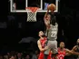 Brooklyn Nets guard Caris LeVert (22) shoots over Toronto Raptors guard Fred VanVleet (23) during the first half at Barclays Center on February 13, 2020