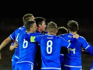 Cathcart heads Northern Ireland in front