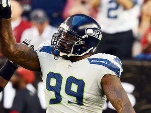 Tony McDaniel of the Seattle Seahawks celebrates a sack against the Arizona Cardinals at University of Phoenix Stadium on October 17, 2013