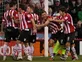 League One roundup: Sheff Utd stay top after win