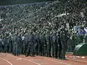 Levski fans are watched by police before a game with Werder Bremen on October 31, 2006