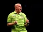Michael van Gerwen of Holland celebrates winning his semi final match against Raymond van Barneveld of Holland during the Betway Premier League at The 02 Arena on May 21, 2015