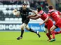 Ospreys' Joe Bearman attempts to get past Toulouse's Thierry Desautoir on December 15, 2012