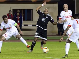 Monaco salvage draw to extend Group J lead