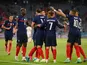 France's players celebrate after Germany's Mats Hummels scores an own goal at Euro 2020 on June 15, 2021