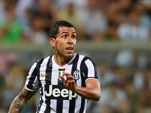 Tevez powers Juve ahead