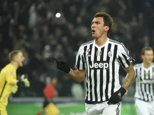 Man City trail to Mandzukic strike