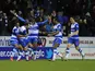 Reading's Adam Le Fondre celebrates with teammates after a stoppage time equaliser against Chelsea on January 30, 2013