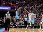 Miami Heat forward Jimmy Butler (22) shoots over Philadelphia 76ers forward Al Horford (42) during the second half at American Airlines Arena on February 4, 2020