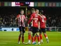 Lincoln City players celebrates goal of Rob Street