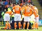 Blackpool's Barry Ferguson is treated after clattering into a teammate on March 16, 2013