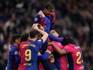 Catch us if you can: Barcelona ease past 10-man Sociedad to go top
