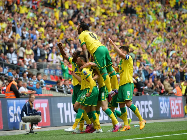 Norwich brush aside Boro to earn top-flight return