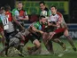 Harlequins' Danny Care is tackled during the match against Biarritz on January 18, 2013